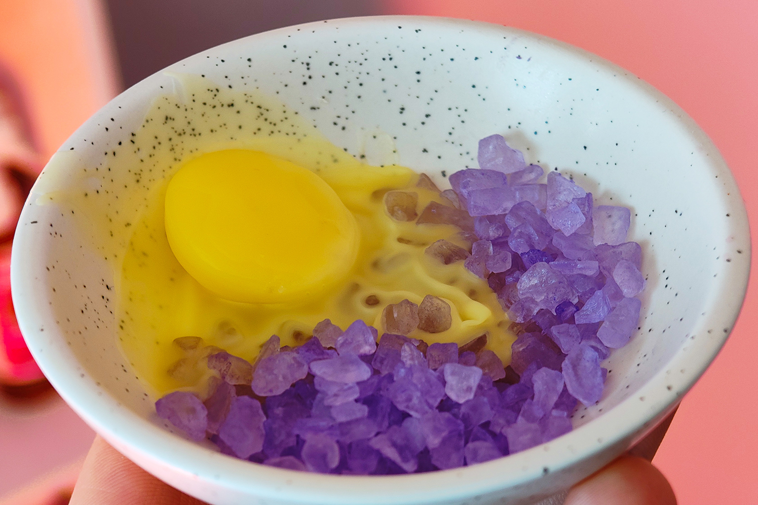sizzlers and wax melt in burner dish showing the melted wax and sizzlers which do not melt