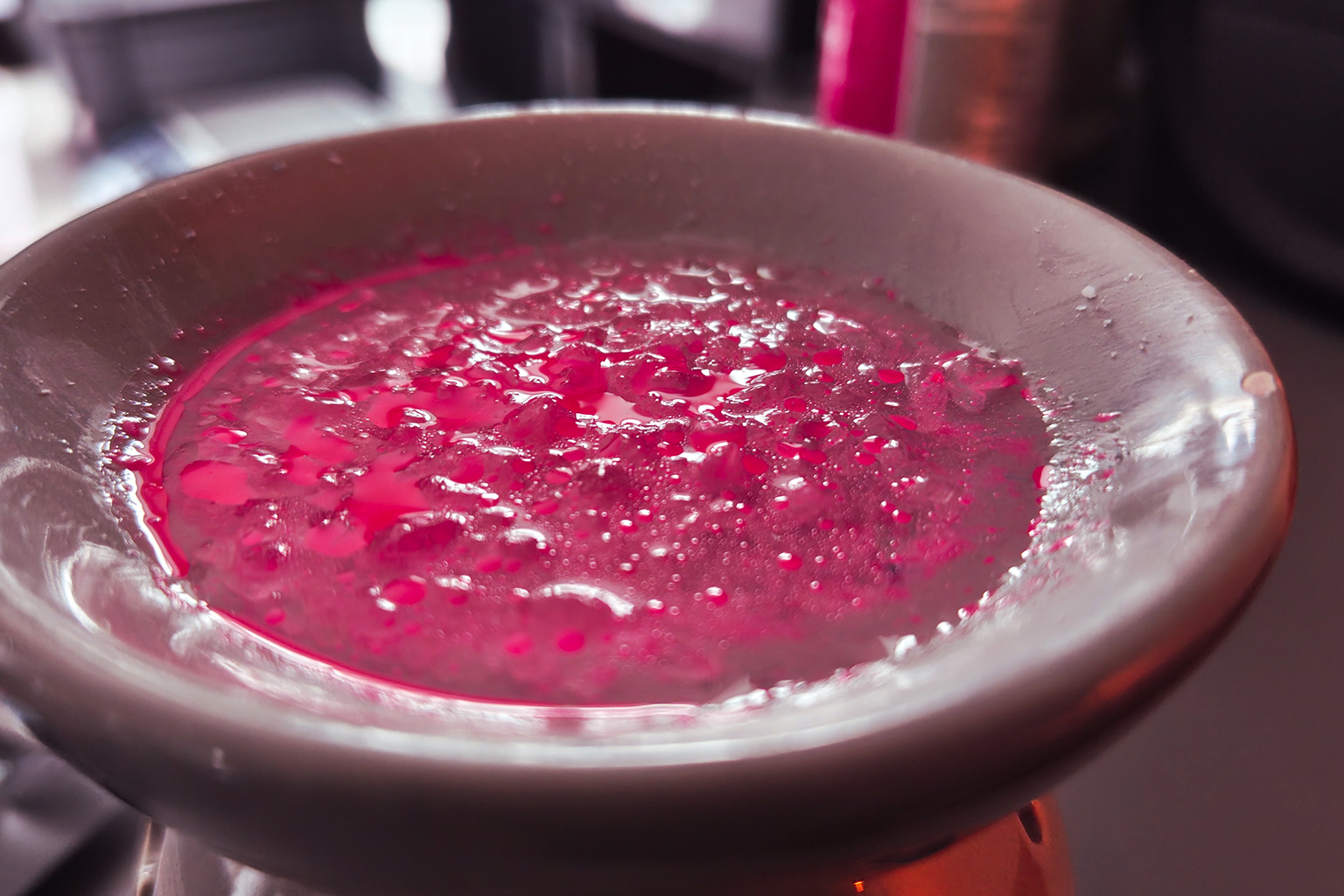 wet simmering granules in wax burner showing how humid rooms can cause sizzlers to absorb moisture from the room